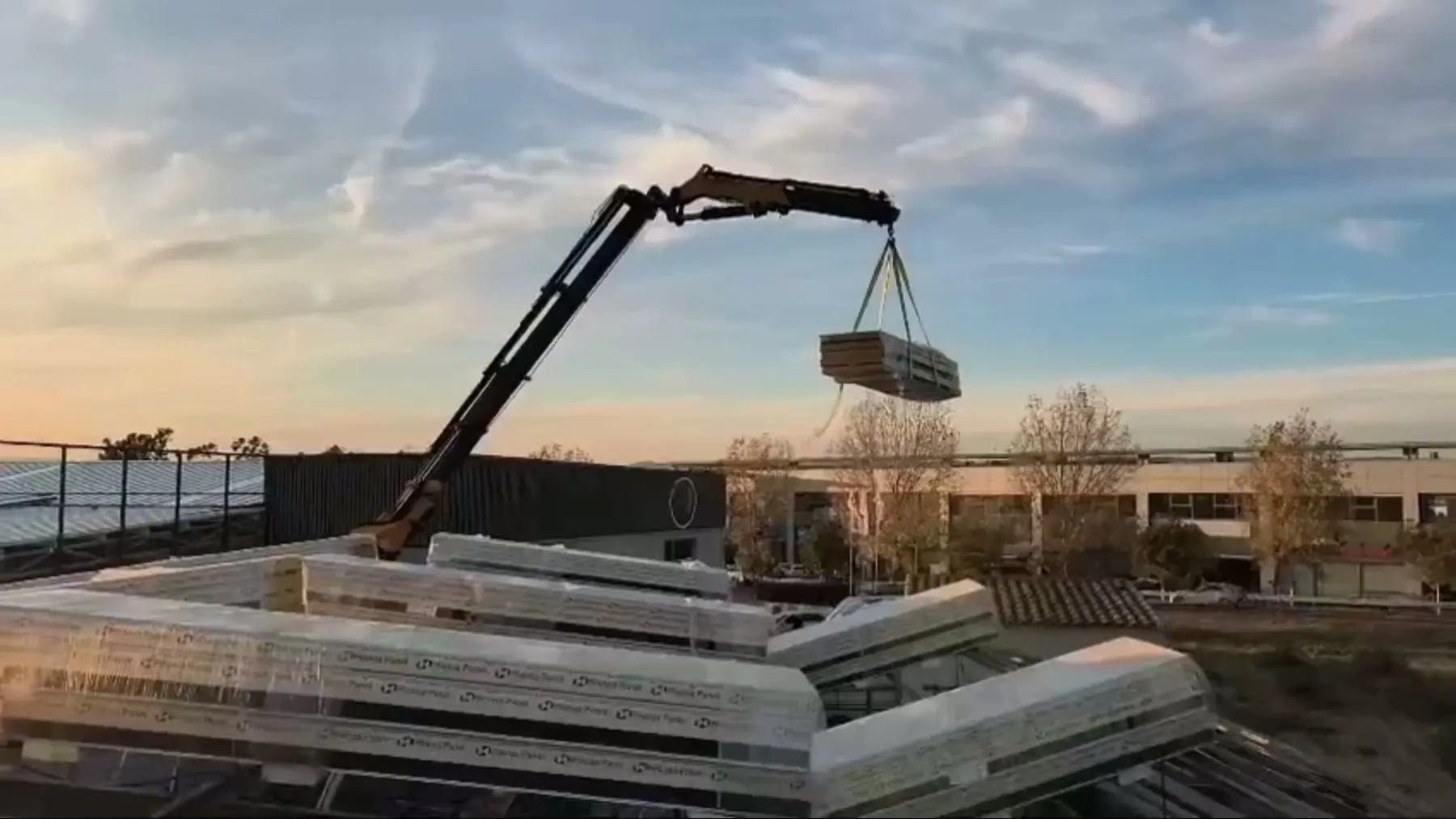 Colocación de materiales con grúa